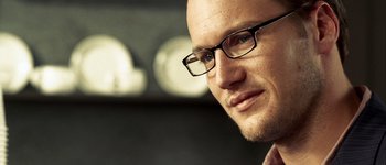 Movie still from “Hard Candy” (2005), directed by David Slade – A person wearing glasses; Close Up shot, Low angle