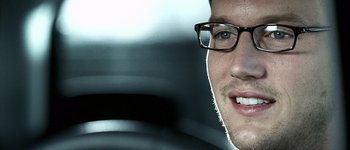 Movie still from “Hard Candy” (2005), directed by David Slade – A person wearing glasses; Extreme Close Up shot, Over the shoulder angle