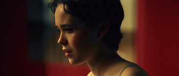 Movie still from “Hard Candy” (2005), directed by David Slade – A person with short hair; Close Up shot, Over the shoulder angle