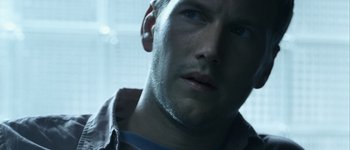 Movie still from “Hard Candy” (2005), directed by David Slade – A man's face in a dark room; Close Up shot, High angle