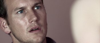 Movie still from “Hard Candy” (2005), directed by David Slade – A man's face with blue eyes; Close Up shot, Over the shoulder angle