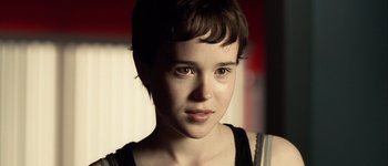 Movie still from “Hard Candy” (2005), directed by David Slade – A person with short brown hair; Close Up shot, Over the shoulder angle