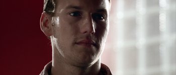 Movie still from “Hard Candy” (2005), directed by David Slade – A young man's face in the sunlight; Close Up shot, Low angle