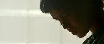 A man's face in the dark