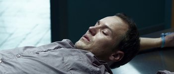 Movie still from “Hard Candy” (2005), directed by David Slade – A person laying on a bed; Close Up shot, High angle