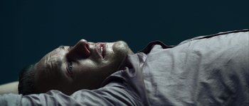 Movie still from “Hard Candy” (2005), directed by David Slade – A person laying on their stomach; Extreme Close Up shot, Overhead angle