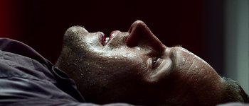 Movie still from “Hard Candy” (2005), directed by David Slade – A person's face with water on them; Extreme Close Up shot, Overhead angle