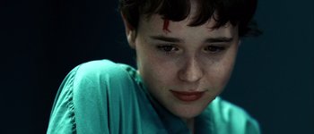 Movie still from “Hard Candy” (2005), directed by David Slade – A boy with a bandage on his head and face; Extreme Close Up shot, Low angle
