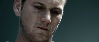 Movie still from “Hard Candy” (2005), directed by David Slade – A man's face with water droplets on it; Extreme Close Up shot, Low angle