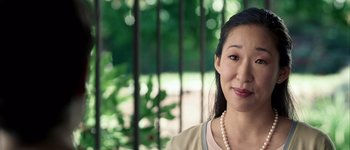 Movie still from “Hard Candy” (2005), directed by David Slade – A person wearing a pearl necklace; Close Up shot, Over the shoulder angle