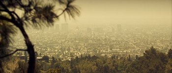 Movie still from “Hard Candy” (2005), directed by David Slade – A view of a large city from a hill; Extreme Wide shot, High angle
