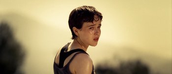 Movie still from “Hard Candy” (2005), directed by David Slade – A young woman with short brown hair is looking at the camera; Close Up shot, High angle