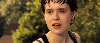 Movie still from “Hard Candy” (2005), directed by David Slade – A person with wet hair; Close Up shot, High angle