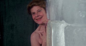 Movie still from “Harold and Maude” (1971), directed by Hal Ashby – An older woman leaning against a wall with her hand on her chest; Close Up shot, Low angle