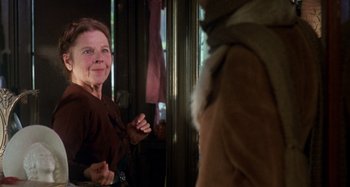 Movie still from “Harold and Maude” (1971), directed by Hal Ashby – An older woman standing in front of a mirror; Close Up shot, Over the shoulder angle