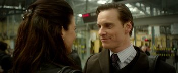 Movie still from “Haywire” (2011), directed by Steven Soderbergh – A man and a woman talking to each other; Close Up shot, Over the shoulder angle