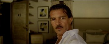 Movie still from “Haywire” (2011), directed by Steven Soderbergh – A person wearing a white shirt; Close Up shot, Low angle