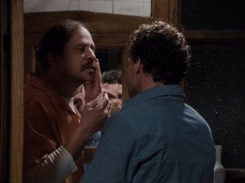 Movie still from “Henry: Portrait of a Serial Killer” (1986), directed by John McNaughton – Two men are fighting in front of a mirror; Close Up shot, Over the shoulder angle
