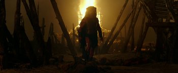 Movie still from “Hercules” (2014), directed by Brett Ratner – A man walking through a forest at night; Wide shot, Low angle