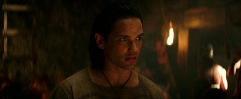 Movie still from “Hercules” (2014), directed by Brett Ratner – A person with long black hair; Close Up shot, Over the shoulder angle