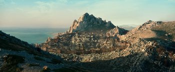 Movie still from “Hercules” (2014), directed by Brett Ratner – An old town sits on top of a mountain; Extreme Wide shot, High angle