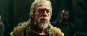 Movie still from “Hercules” (2014), directed by Brett Ratner – An old man with long white hair and a beard; Close Up shot, Low angle