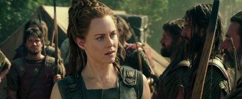 Movie still from “Hercules” (2014), directed by Brett Ratner – A woman that is standing in the woods; Close Up shot, Over the shoulder angle