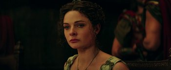 Movie still from “Hercules” (2014), directed by Brett Ratner – A person wearing a necklace; Close Up shot, Over the shoulder angle