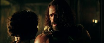 Movie still from “Hercules” (2014), directed by Brett Ratner – A person with long hair and a beard; Close Up shot, Over the shoulder angle