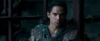 Movie still from “Hercules” (2014), directed by Brett Ratner – A person with long black hair; Close Up shot, Over the shoulder angle