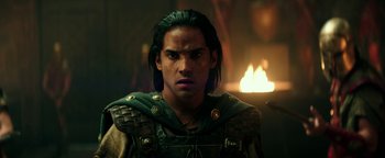 Movie still from “Hercules” (2014), directed by Brett Ratner – A person with long black hair; Close Up shot, Over the shoulder angle