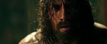 Movie still from “Hercules” (2014), directed by Brett Ratner – A person with long hair and a beard; Close Up shot, Over the shoulder angle