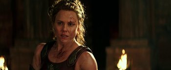 Movie still from “Hercules” (2014), directed by Brett Ratner – A person with a scar on her face; Close Up shot, Over the shoulder angle