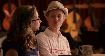 Movie still from “High School Musical 3: Senior Year” (2008), directed by Kenny Ortega – A man and a woman sitting next to each other; Medium shot, Over the shoulder angle