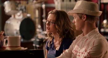Movie still from “High School Musical 3: Senior Year” (2008), directed by Kenny Ortega – A woman and a man standing next to each other; Close Up shot, Over the shoulder angle