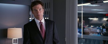 Movie still from “Horrible Bosses” (2011), directed by Seth Gordon – A man in a suit and a tie; Close Up shot, Over the shoulder angle