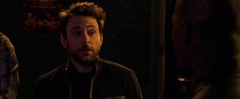 Movie still from “Horrible Bosses” (2011), directed by Seth Gordon – A person wearing a jacket; Close Up shot, Over the shoulder angle
