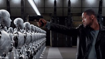 Movie still from “I, Robot” (2004), directed by Alex Proyas – A man holding a gun in front of a row of mannequins; Medium shot, High angle