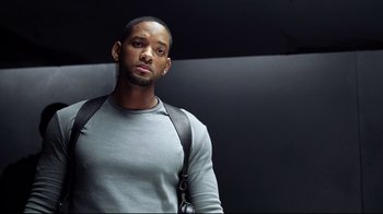 Movie still from “I, Robot” (2004), directed by Alex Proyas – A person with a backpack; Close Up shot, Low angle