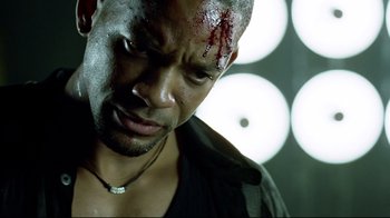 Movie still from “I, Robot” (2004), directed by Alex Proyas – A person with blood on his face; Close Up shot, Low angle