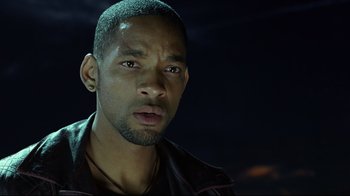Movie still from “I, Robot” (2004), directed by Alex Proyas – A person wearing a leather jacket; Close Up shot, Over the shoulder angle