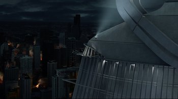 Movie still from “I, Robot” (2004), directed by Alex Proyas – A view of a city at night from a skyscraper; Extreme Wide shot, Overhead angle
