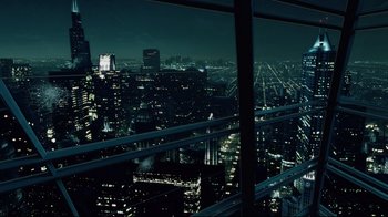 Movie still from “I, Robot” (2004), directed by Alex Proyas – A view of a city at night from a skyscraper; Extreme Wide shot, High angle