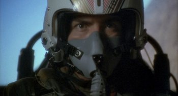 Movie still from “Hot Shots!” (1991), directed by Jim Abrahams – A person wearing a helmet; Close Up shot, Low angle