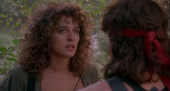 Movie still from “Hot Shots! Part Deux” (1993), directed by Jim Abrahams – A person talking to another person; Close Up shot, Over the shoulder angle