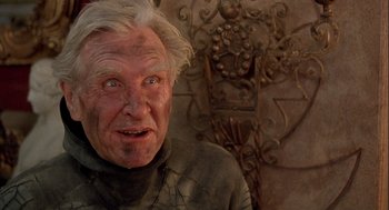 Movie still from “Hot Shots! Part Deux” (1993), directed by Jim Abrahams – An old man with white hair and blue eyes; Close Up shot, Low angle