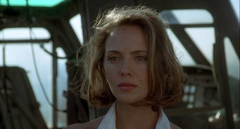 Movie still from “Hot Shots! Part Deux” (1993), directed by Jim Abrahams – A person with short brown hair; Close Up shot, Low angle