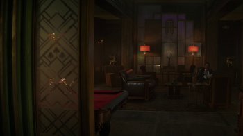 Movie still from “Hotel Artemis” (2018), directed by Drew Pearce – A living room with a pool table and a couch; Wide shot, High angle