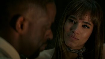 Movie still from “Hotel Artemis” (2018), directed by Drew Pearce – A man and a woman looking at one another; Close Up shot, Over the shoulder angle