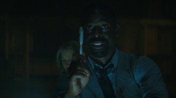 Movie still from “Hotel Artemis” (2018), directed by Drew Pearce – A man holding a tooth brush in a dark room; Close Up shot, Low angle